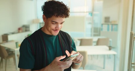 Education, phone and smile with student in classroom of university for social media or study. App, learning and text message with man in college class for communication, development or scholarship