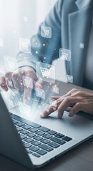 Wall Mural - hands using laptop, shopping cart icons float above, showcasing online shopping, e-commerce concept,