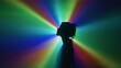 © kinomaster - Silhouette of woman in rainbow light burst