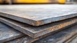 © Agri - Stacked metal plates close-up.