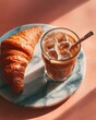 © aboutnuylove - Croissant and a glass of iced coffeele table