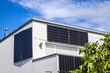 © Brebca - Balcony solar power plant. Solar battery on balcony wall. Mini PV plants generate your own electricity plug play