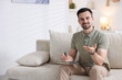 © New Africa - Professional psychologist with notebook on sofa in office. Space for text