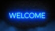 © Digistock - Glowing welcome neon sign illuminating a dark brick wall with inviting blue light