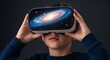 © Dmitry - A boy exploring a galaxy in a virtual reality headset. Kids learning about space and future technology. Virtual education