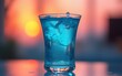 © ming - Beautiful blue cocktail glass glistening with condensation sits elegantly against a vibrant backdrop highlighting the refreshing essence of summer drinks and joyful social gatherings. High quality