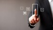 © Passakorn - Seamless E-Commerce Transactions with Secure Payment Gateway Solutions, A businessman interacts with digital icons on a touchscreen, symbolizing online transactions.