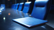 © Blurred Ink - Empty modern boardroom with blue chairs and a leather folder on a long table, concept for corporate meeting preparation and business strategy