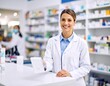 © Andre - Female pharmacist selling prescribed medications at the drugstore - healthcare and medicine concepts.