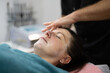 © Tsyb Oleh - girl at a cosmetologist during treatment procedures