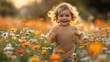 © ganlaya - a joyful child running through a field of flowers