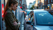 © Ventura - s a woman standing next to a car on a city street. She is wearing a coat and a watch