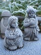 © Lens Focus - Frosted Garden Statues in Winter Landscape