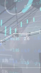 Wall Mural - animation of statistical and stock market data processing against low angle view of tall buildings