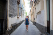 © Melinda Nagy - woman tourist walking in quiant old town