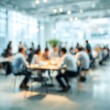 © anika - Soft of blurred people meeting at table. Abstract white blurred office interior space background. Business people working at office, blurred background. Business concept.