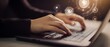 © Rio - Hands typing on a laptop with digital interface overlay.