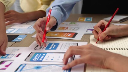 Wall Mural - panorama video of startup company employee planning on user interface prototype for mobile applicati