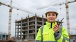 © sabrang - Female Engineer Overseeing Construction Project with Cranes and Steel Framework Under Cloudy Sky
