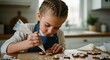 © Meow Creations - Focused young girl decorating gingerbread cookies with icing and colorful sprinkles