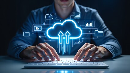 man typing on a keyboard with a glowing blue cloud computing interface and data flow icons symbolizi