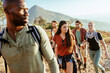 © Marko Geber - Young and diverse group of friends and hikers hiking together in the mountains of south africa