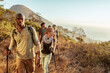 © Marko Geber - Young and diverse group of friends and hikers hiking together in the mountains of south africa