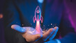 © Aminul - Neon rocket launch from open hand symbolizing business startup success
