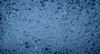 © DURJOY_SAID - Detailed close up showcases the intricate structure of foam with a blue tint, creating an interesting abstract design.