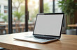 © Viktor - Laptop pc mockup with blank screen on office workspace desk. Modern laptop at work table. Empty white display for web design, content, marketing, app presentation.