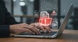 © ekam - Data Security Breach Alert: Business Professional Working on Laptop with Warning Icons