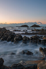 Wall Mural - layer of rocky coastline in the morning.
