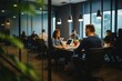 © Jony - Contemporary Office Meeting: Diverse team collaborating around a modern conference table within glass walls, enhancing transparency and a collaborative corporate environment in action.