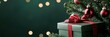 © Sanwa - Festive Green Gift Box Under Christmas Tree - A green gift box with a red ribbon sits under a decorated Christmas tree against a dark green background