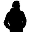 © Julia vector & video - Silhouette of a young man wearing headphones and hoodie standing