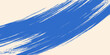 © Susilo - Grainy blue bold brush stroke with spray texture. Hand drawn distress damaged edge vintage template, banner. Grainy bold brush strokes texture with small dots. Retro vector background for posters.