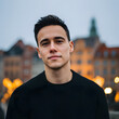 © Andri - Pensive Young Man Looking Away in City