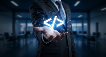 Businessman Holding Glowing Code Symbol, Representing Software Development, Technology, and Digital Transformation.