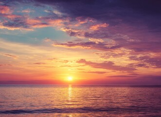 Wall Mural - Beautiful sunset over the sea with  colorful sky and sun in the evening time