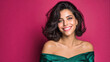 © Vishwesh - Middle eastern arabic young lady portrait of beautiful woman with green dress and dark hair smiling on a pink background image photo