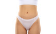 © Dimid - A +size woman in white underwear on a white background. Healthy lifestyle, sport and diet.