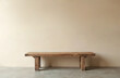 © Vadym - Rustic wooden bench with rough-hewn texture rests against smooth light beige wall. Natural wood grain, solid construction suggest durability, organic design. Placed on clean concrete floor, piece