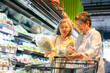 © CandyRetriever  - Happy Asian senior woman shopping buying food and grocery at supermarket. Elderly women friends enjoy healthy lifestyle choosing and buying organic fresh food, vegetable and fruit at shopping mall.