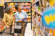 © CandyRetriever  - Happy Asian senior woman shopping buying food and grocery at supermarket. Elderly women friends enjoy healthy lifestyle reading label, choosing organic safety food, vegetable and groceries on shelf.