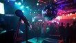© rejeqy - Microphone and disco ball on stage with crowd of people in background