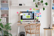 © Pixel-Shot - Interior of office with web designer's workplace and plants