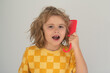 © Volodymyr - Tangled kids hair. Child with a comb and problem hair. Kids shampoo. Hair does not comb without a conditioner balm.