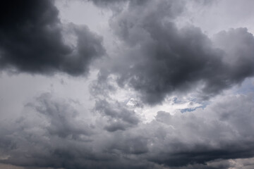 Wall Mural - dark sky with stormy clouds. dramatic sky rain,dark clouds before a thunder-storm,clouds before rain