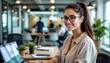 © AIvory - a young woman in glasses is working at an office desk, with a pleasant expression. she's seated in front of a laptop and appears to be focused on her work