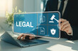 © Creativeraf - A business professional is using a laptop to access legal documents and information, ensuring compliance and protection for the company
